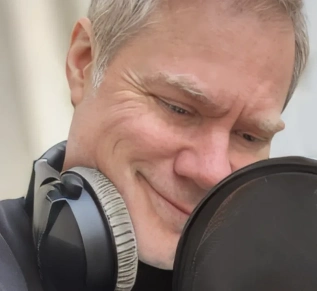 A British voice in a studio setting getting ready for a recording